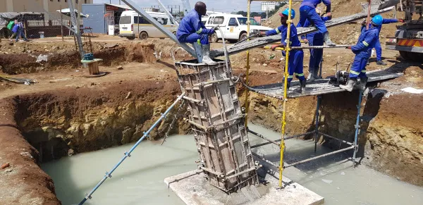 Pouring concrete in the plinth tower.